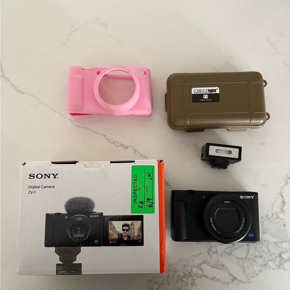 Sony ZV-1 Digital Camera with Black and Pink Accessories